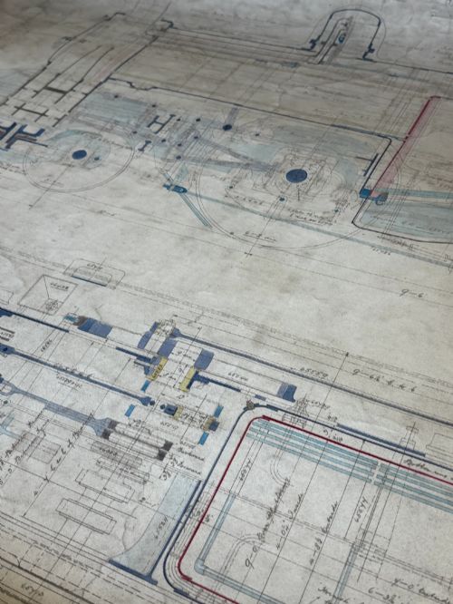 fig 2. A large hand-drawn Edwardian technical engineering plan of a steam locomotive rendered in ink with coloured accents on aged paper.