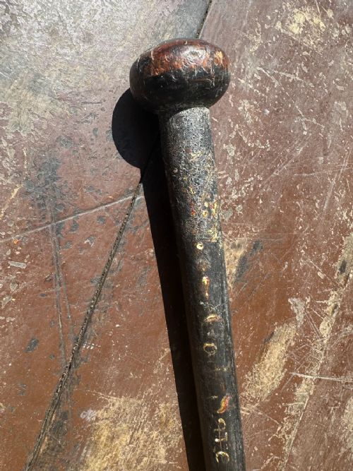 A GEORGE III CUDGEL OR STAVE WITH TRACES OF ORIGINAL PAINT - 'GOD SAVE THE KING"