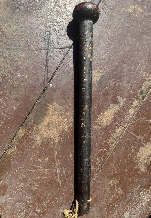 A dark turned wooden George III cudgel featuring hand-painted lettering that reads God Save The King. View V