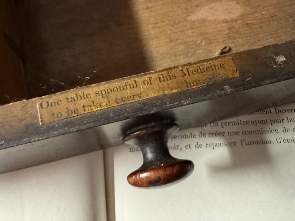 A 19TH CENTURY SET OF MAHOGANY APOTHECARY WALL SHELVES WITH ORIGINAL LABELS TO DRAWER INTERIORS View IX