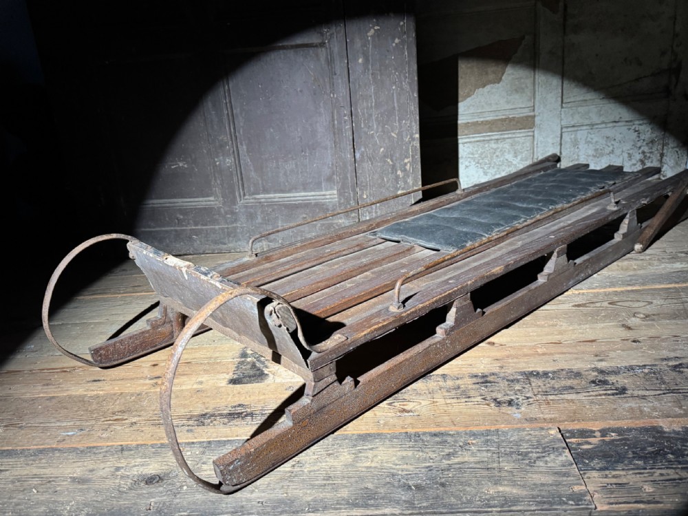 EARLY 20TH CENTURY WOODEN TOBOGGAN WITH METAL SKIDS AND WOODEN BRAKES AND ORIGINAL SEAT View IV
