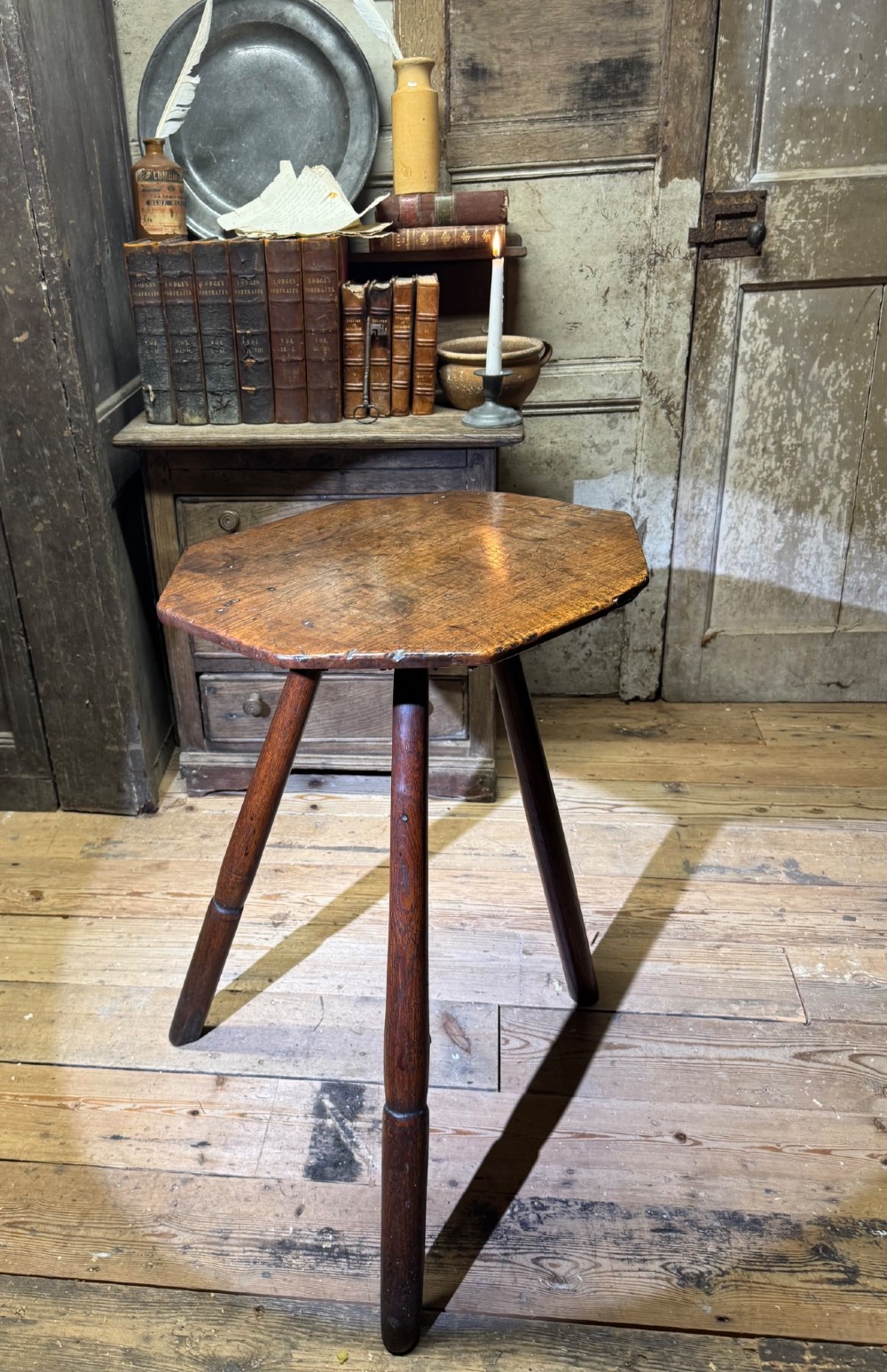 AN 18TH CENTURY PRIMITIVE OAK SLAB TOP OCTAGONAL CRICKET TABLE OF EXCEPTIONAL COLOUR