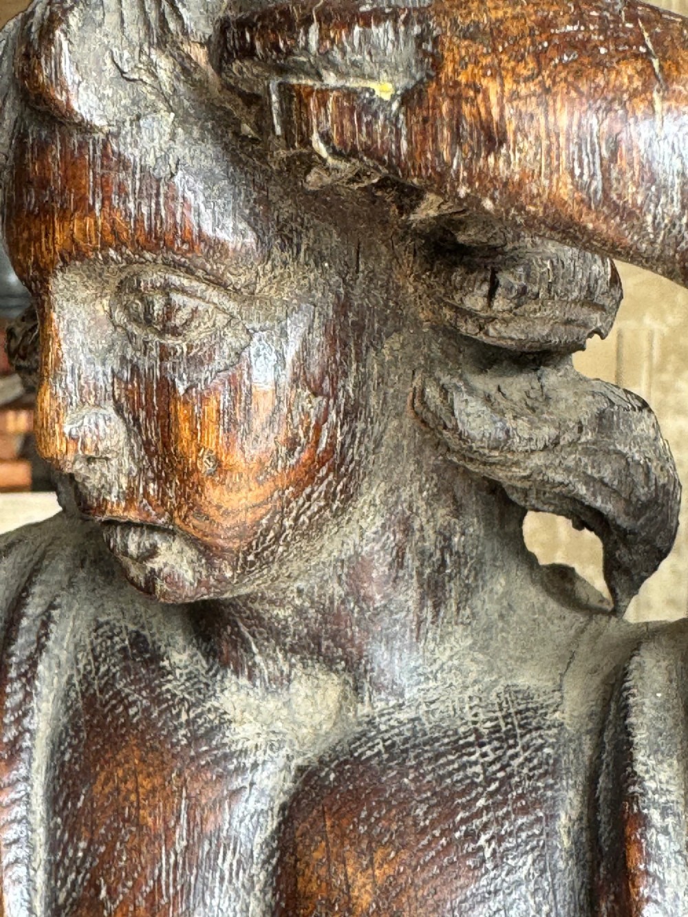 An 18th-century carved oak standing male figure with drapery across his shoulder set on a rounded base. View III