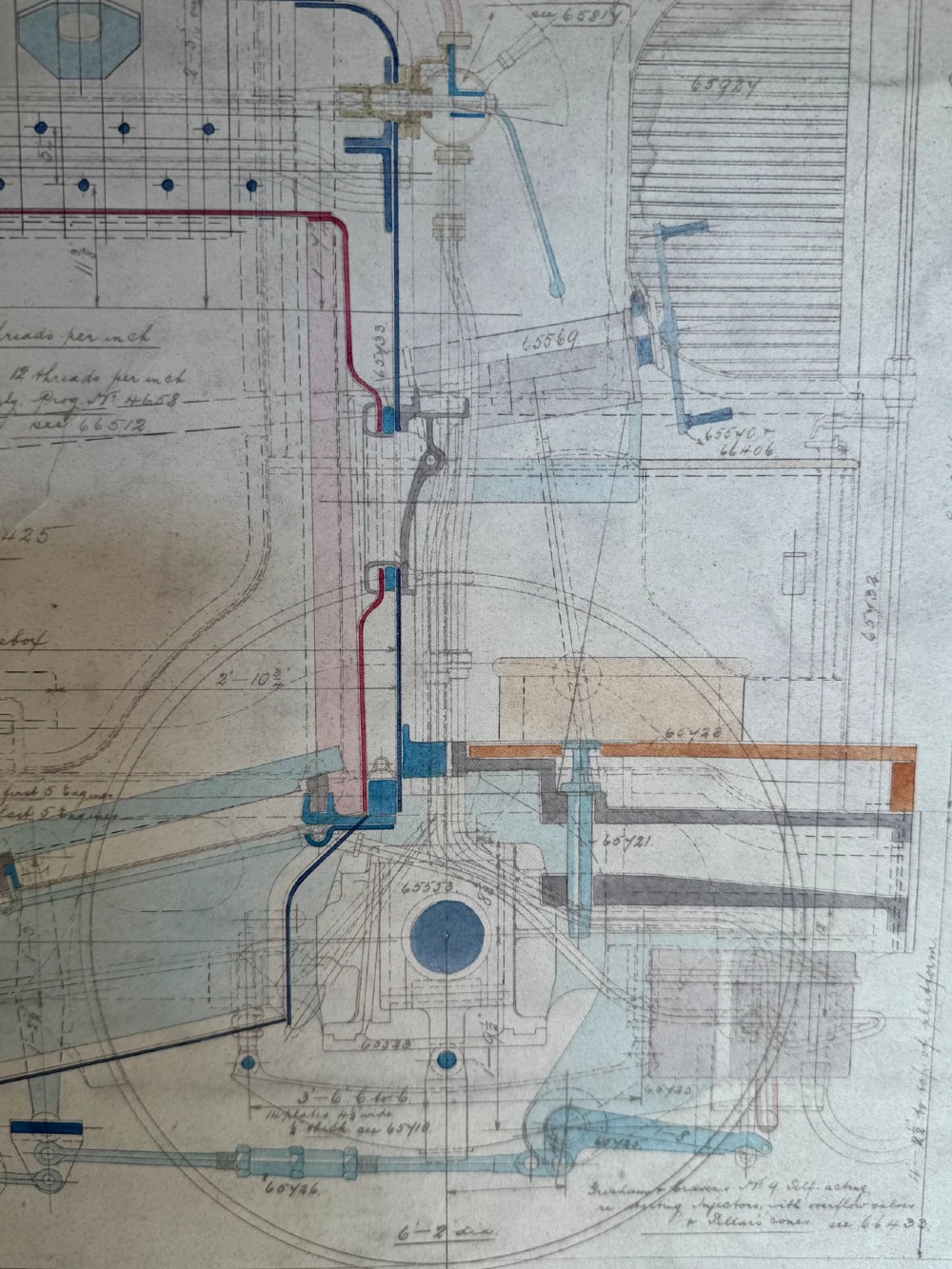 A large hand-drawn Edwardian technical engineering plan of a steam locomotive rendered in ink with coloured accents on aged paper. View IV