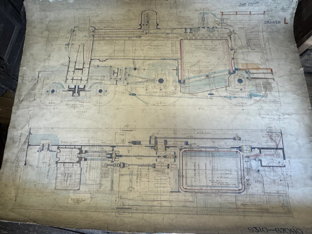 A large hand-drawn Edwardian technical engineering plan of a steam locomotive rendered in ink with coloured accents on aged paper. View V