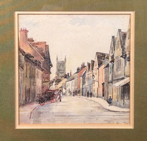fig 1. An Edwardian watercolour painting depicting a historic street in Norwich with timber-framed buildings, a horse-drawn carriage, and a church tower in the background.