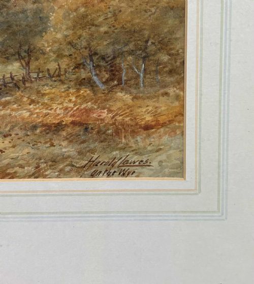 fig 2. A horizontal watercolour painting depicting cattle standing in a river surrounded by hills and trees in the Welsh countryside.