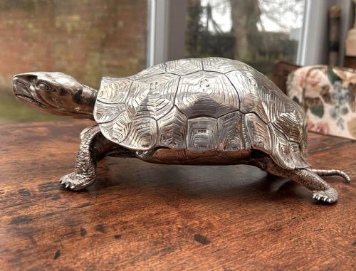 fig 1. An Edwardian solid silver inkstand detailed in the naturalistic form of a walking tortoise.