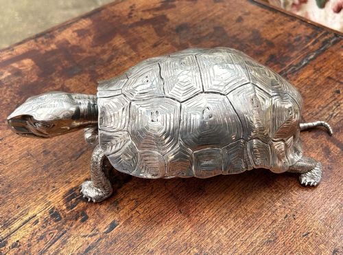fig 2. An Edwardian solid silver inkstand detailed in the naturalistic form of a walking tortoise.