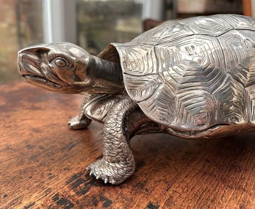 fig 3. An Edwardian solid silver inkstand detailed in the naturalistic form of a walking tortoise.