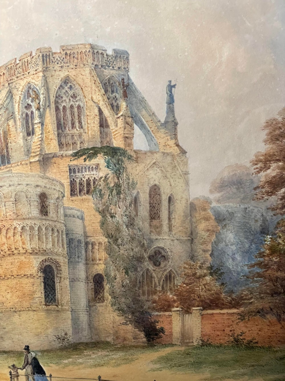 A nineteenth-century watercolour painting depicting Norwich Cathedral with a detailed spire, flying buttresses, and figures on the surrounding lawn. View VIII