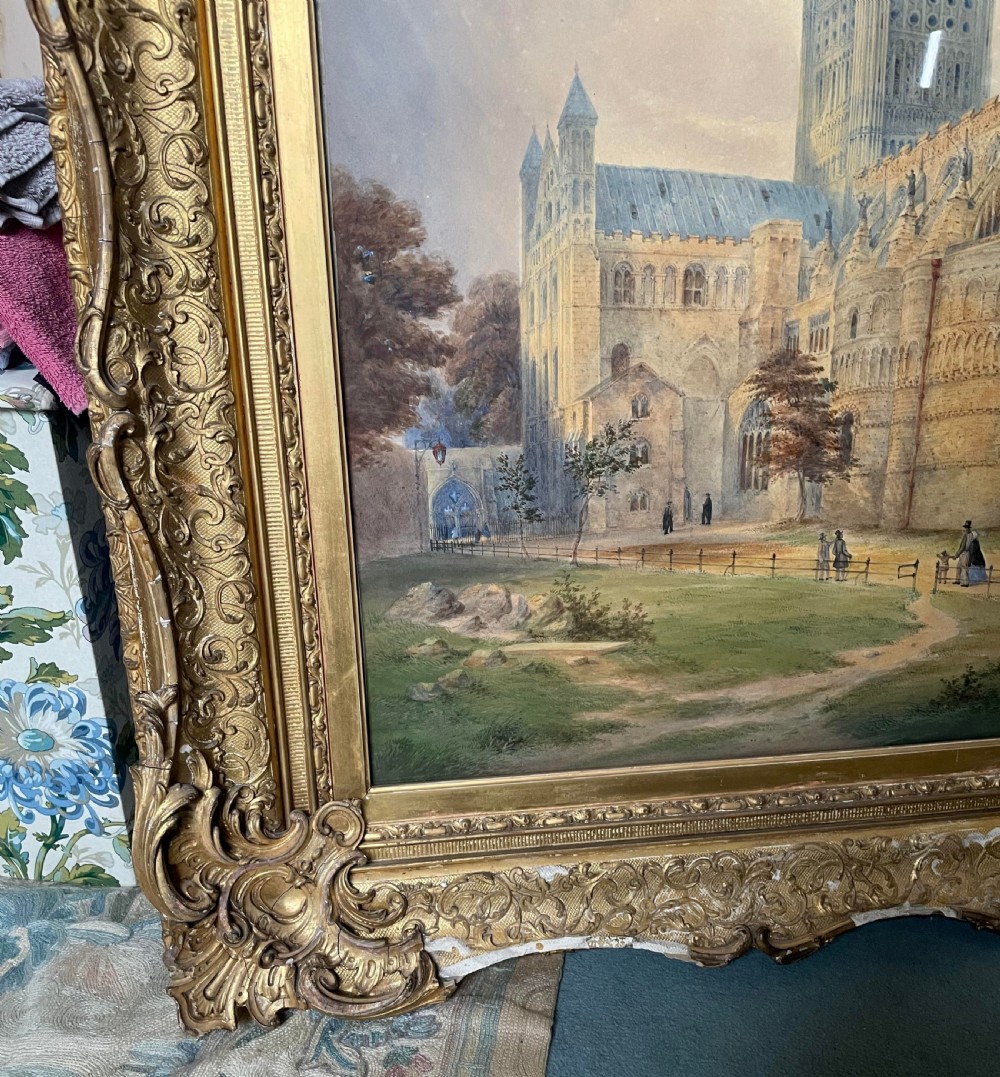 A nineteenth-century watercolour painting depicting Norwich Cathedral with a detailed spire, flying buttresses, and figures on the surrounding lawn. View XI