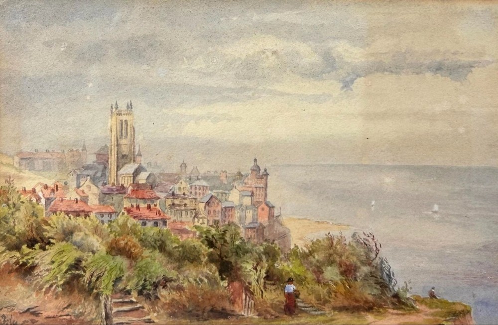 A 19th-century watercolour landscape illustrating a coastal town with a church tower, red-roofed buildings, a grassy cliff path, and a serene sea view.