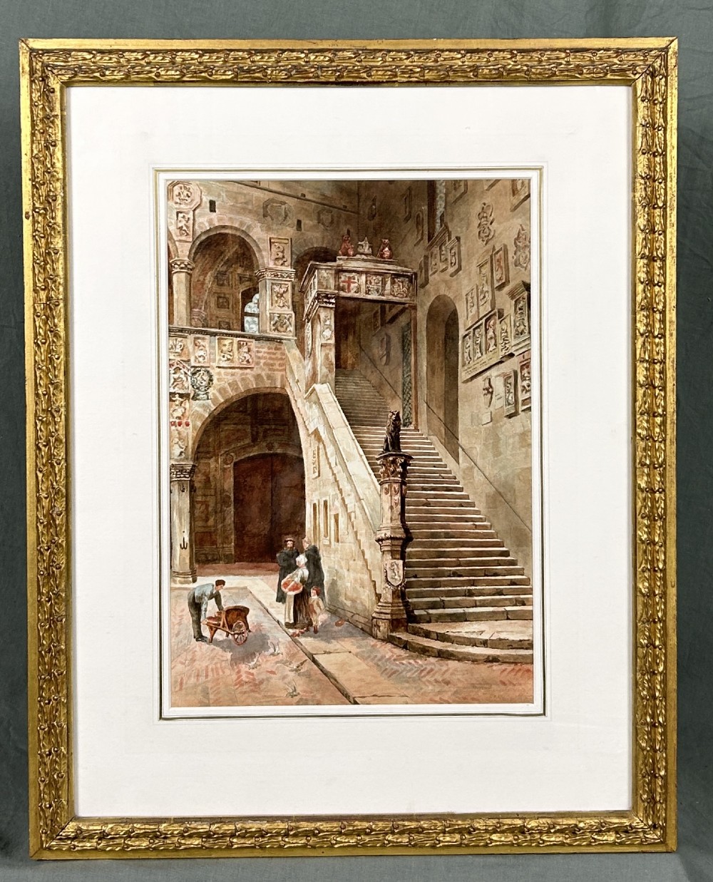 A framed watercolour painting depicting the stone courtyard and grand staircase of the Bargello in Florence with figures at the base.