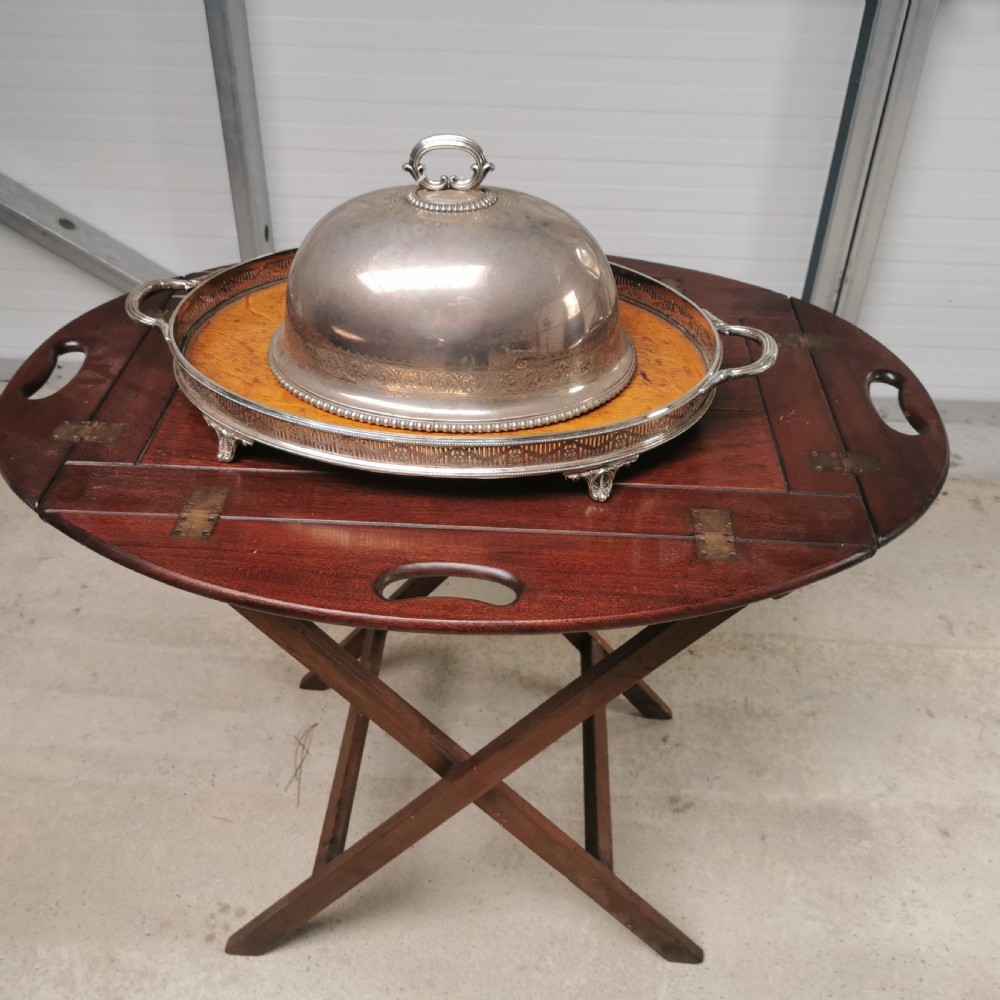 An oval antique oak serving tray with a silver-plated pierced gallery rim, twin handles, and an unengraved shield cartouche in the centre. View IV