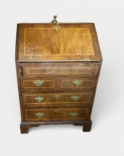SMALL GEORGE III WALNUT BUREAU WITH STEPPED INTERIOR