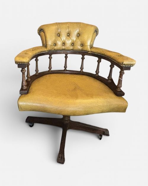 EARLY 20TH CENTURY LEATHER UPHOLSTERED MAHOGANY REVOLVING DESK ARMCHAIR