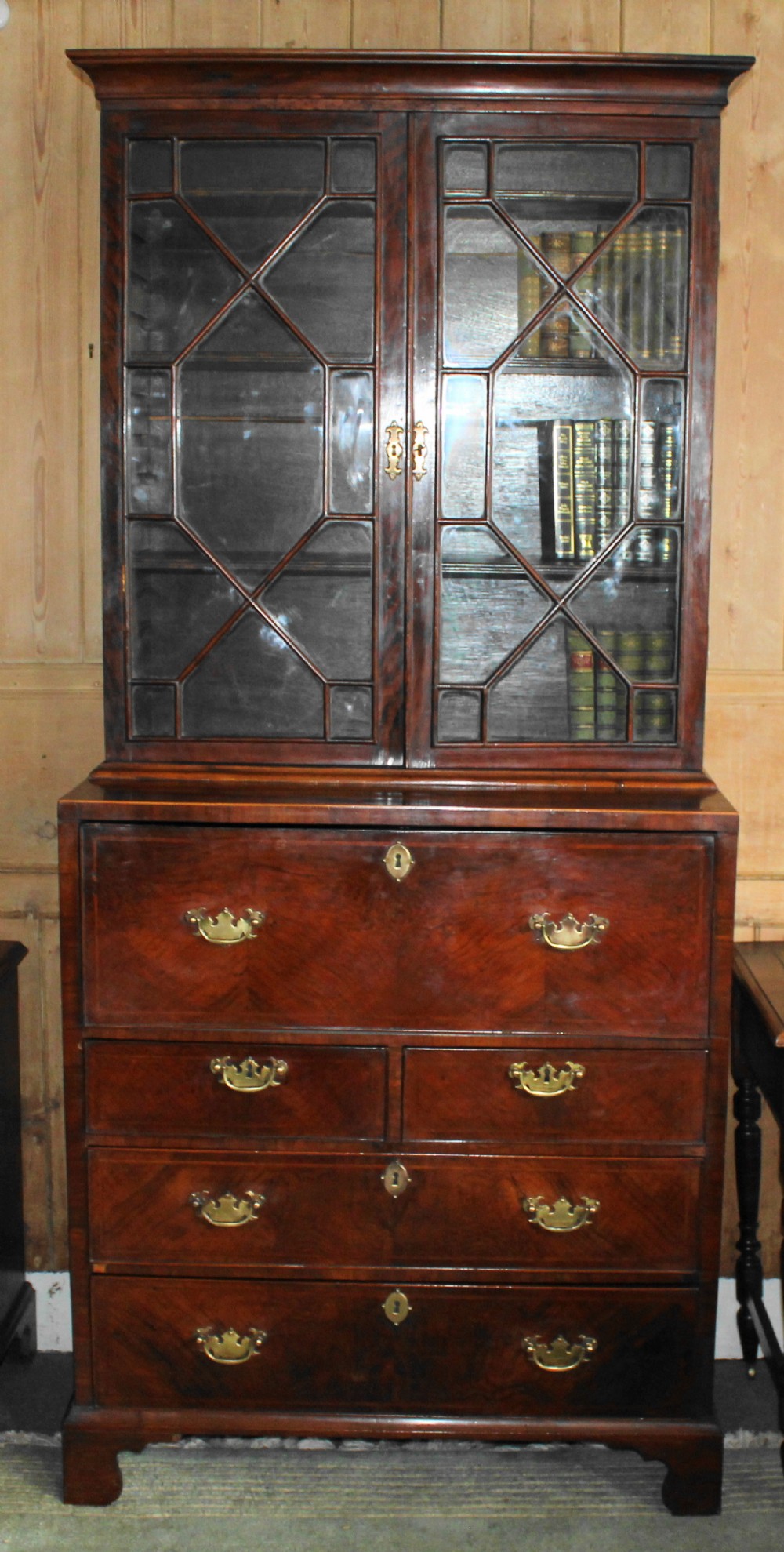 19th century figured walnut and herringbone inlaid secretaire bookcase