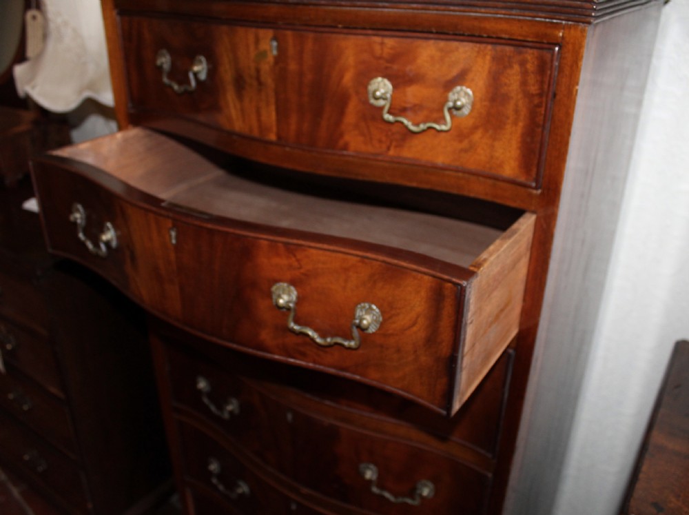 Mahogany tall and narrow serpentine chest of drawers View VI