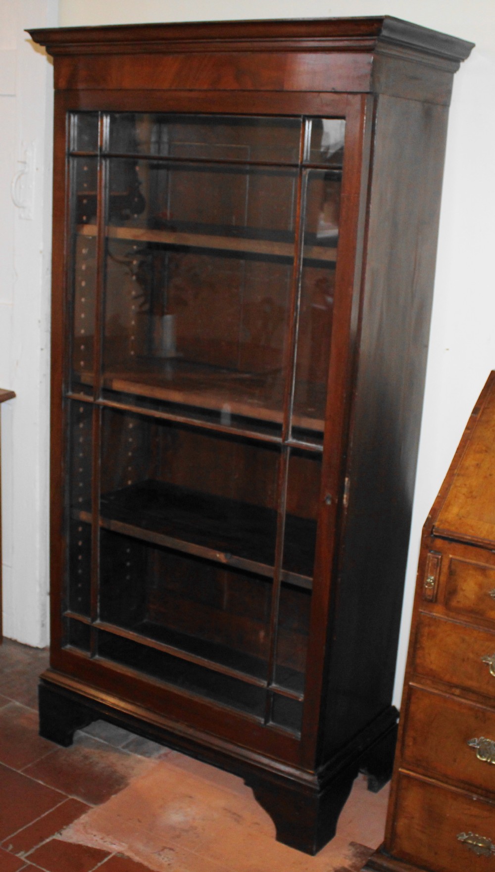 Tall and narrow Victorian mahogany glazed bookcase
