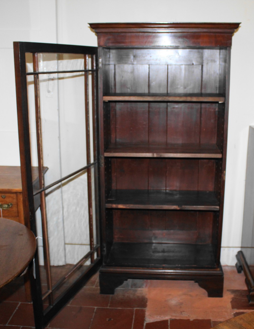 Tall and narrow Victorian mahogany glazed bookcase View II