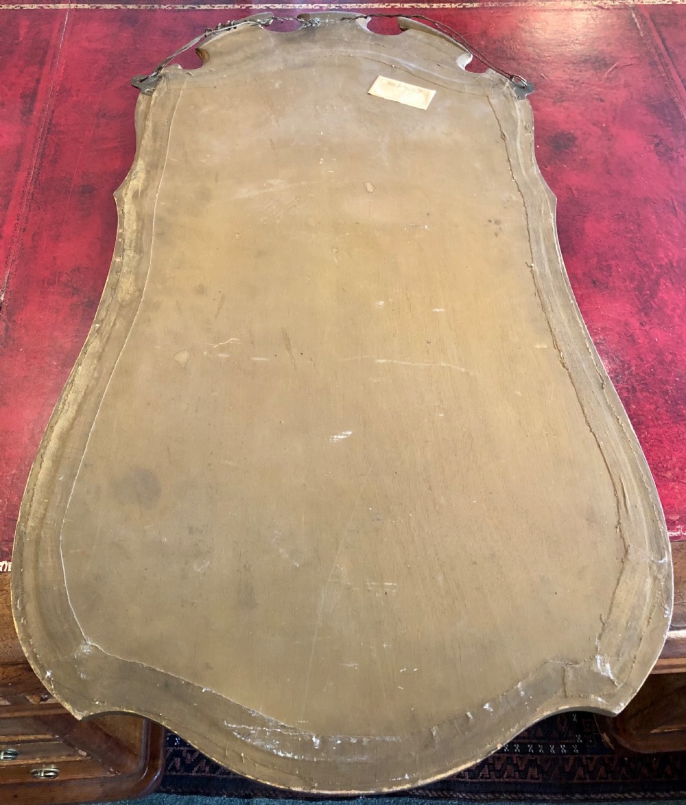 19th century gilt wood Cartouche shape wall mirror.  View VII
