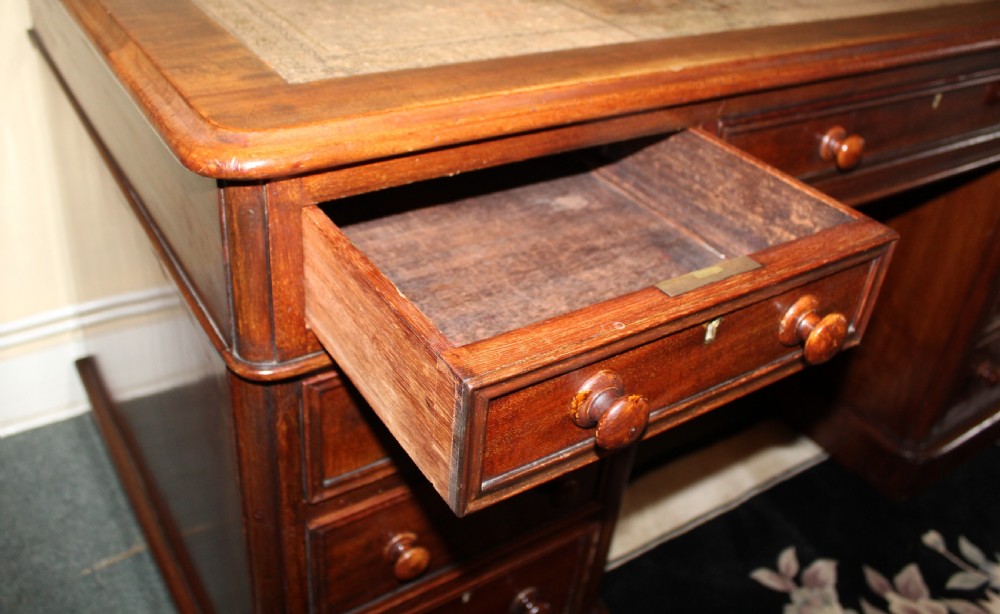 Large Victorian mahogany pedestal desk with leather top View VI