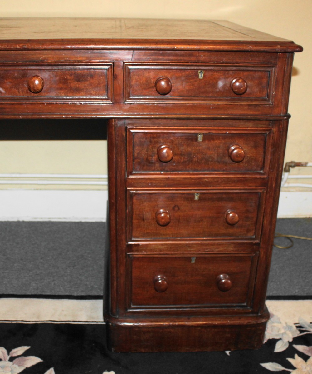 Large Victorian mahogany pedestal desk with leather top View VIII