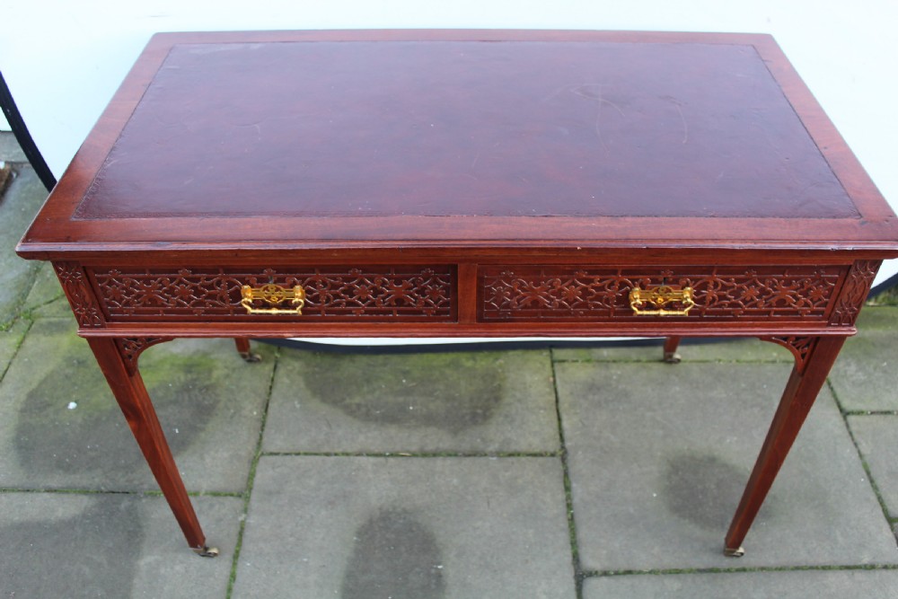Victorian mahogany side/writing table with blind fret carving View III
