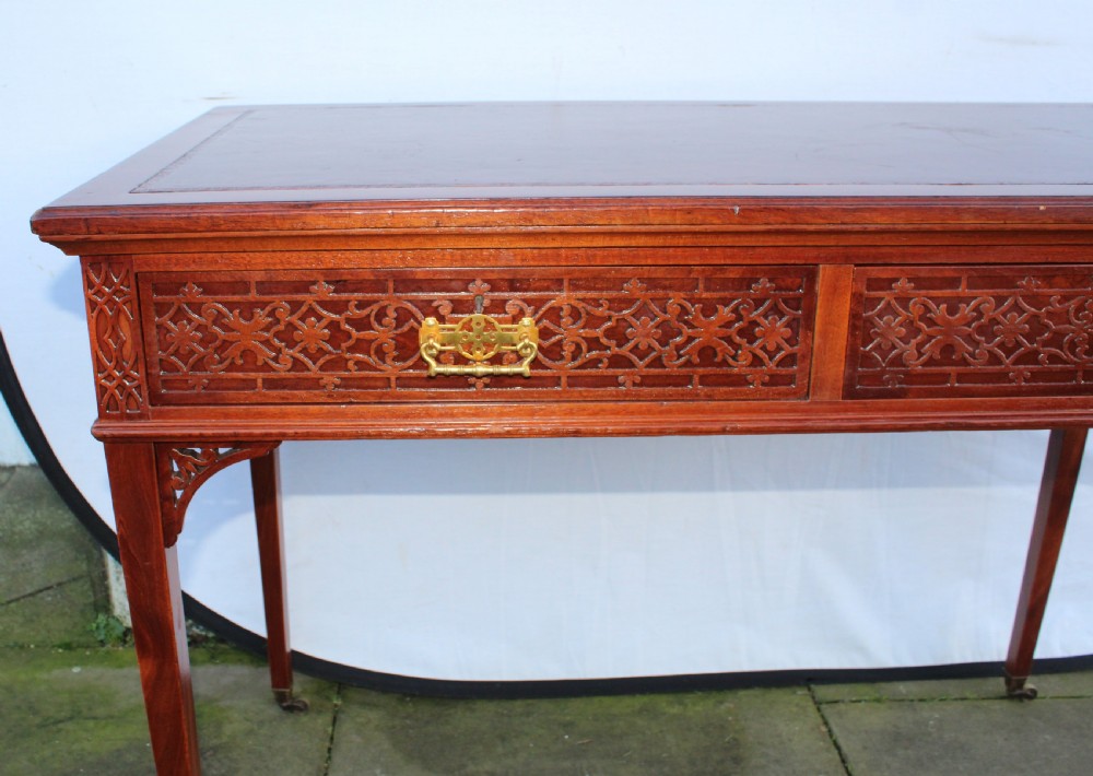 Victorian mahogany side/writing table with blind fret carving View IV