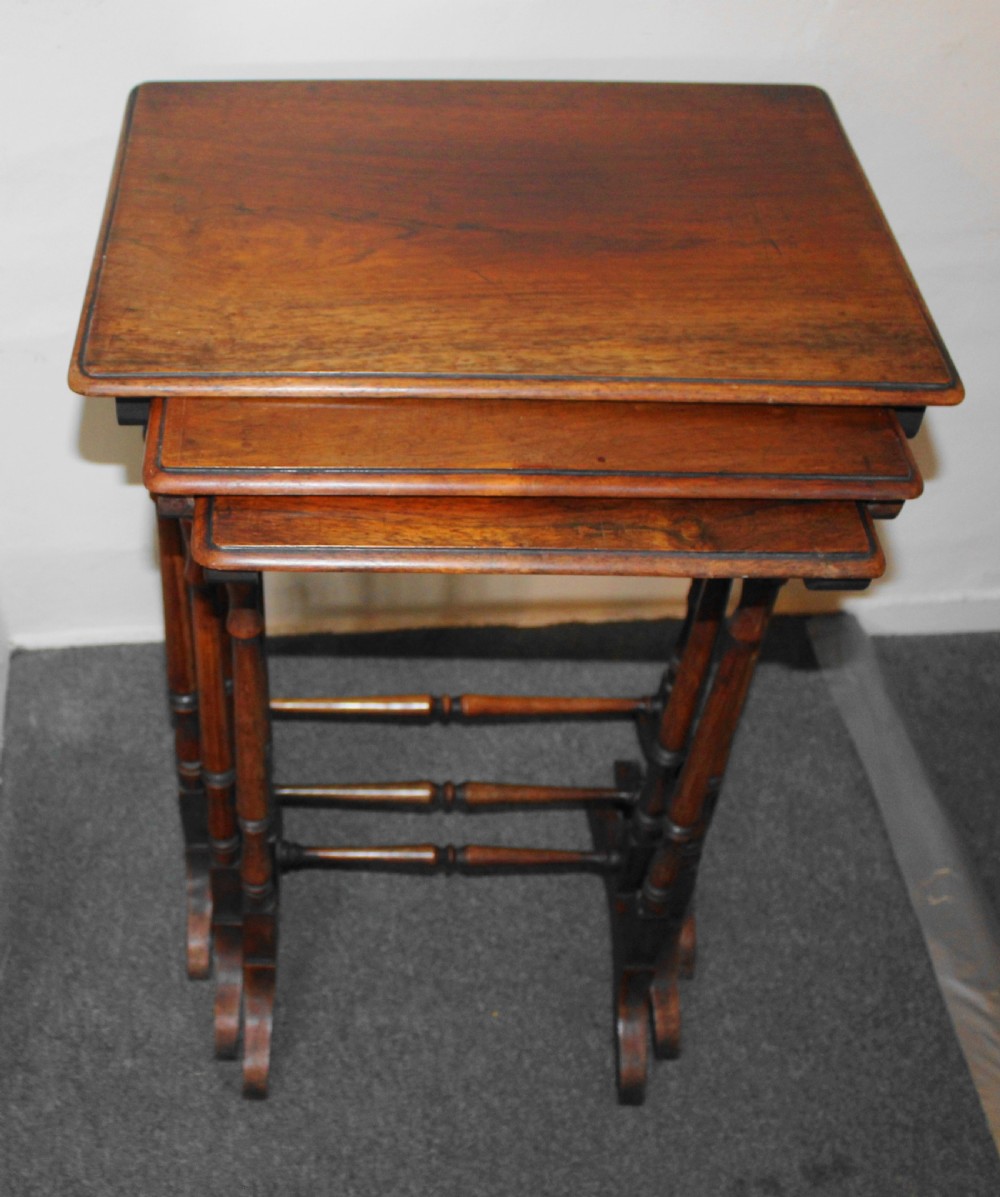 Fine Nest of three early 19th century rosewood tables  View II