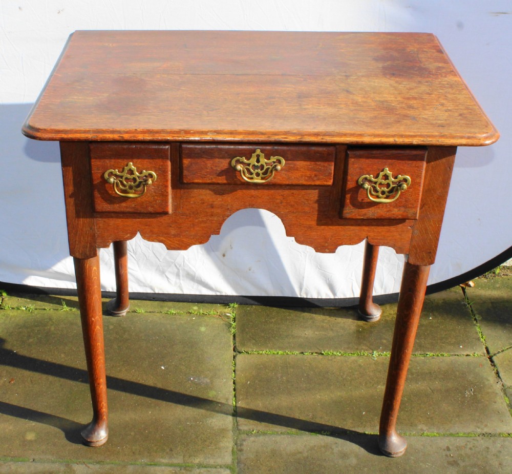 Small George III oak lowboy View III