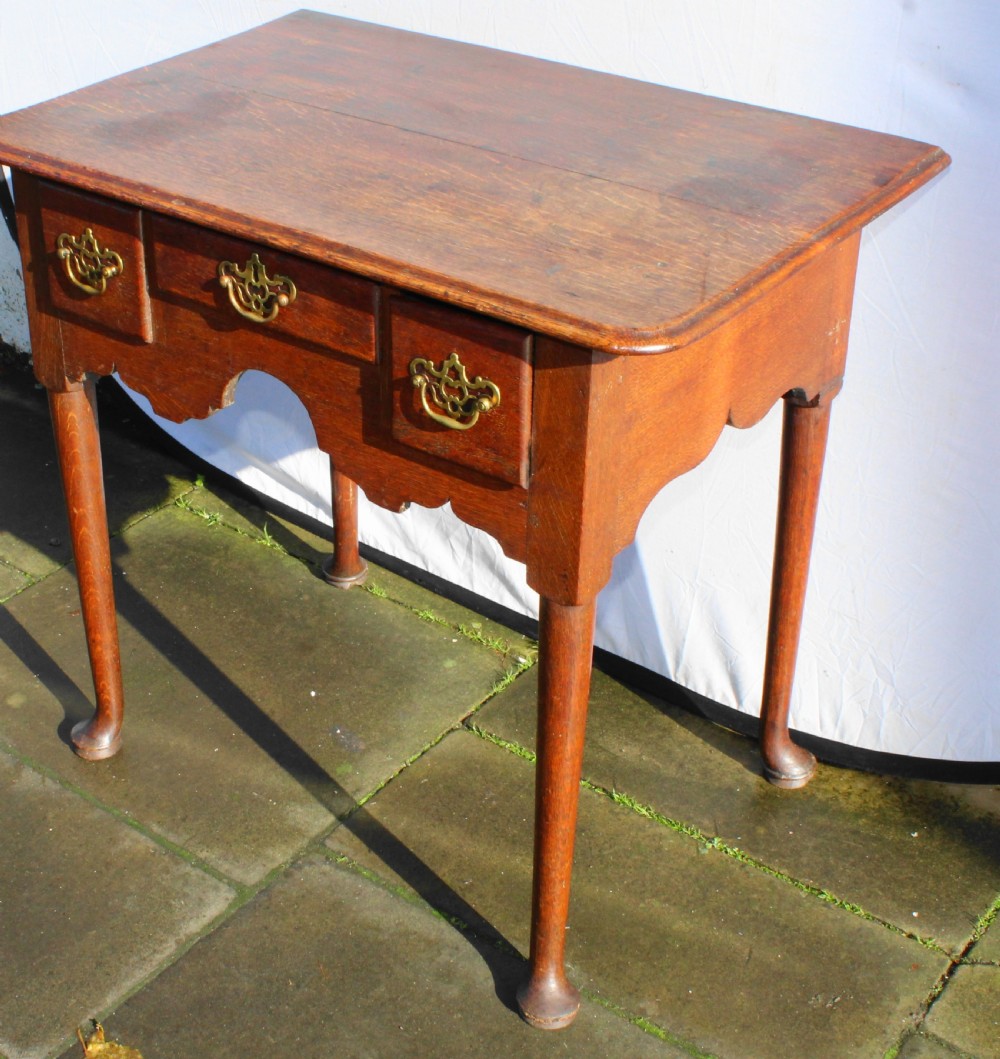 Small George III oak lowboy View V
