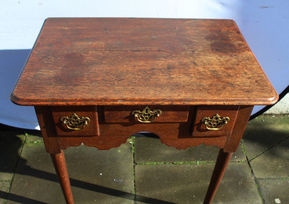 Small George III oak lowboy View VII
