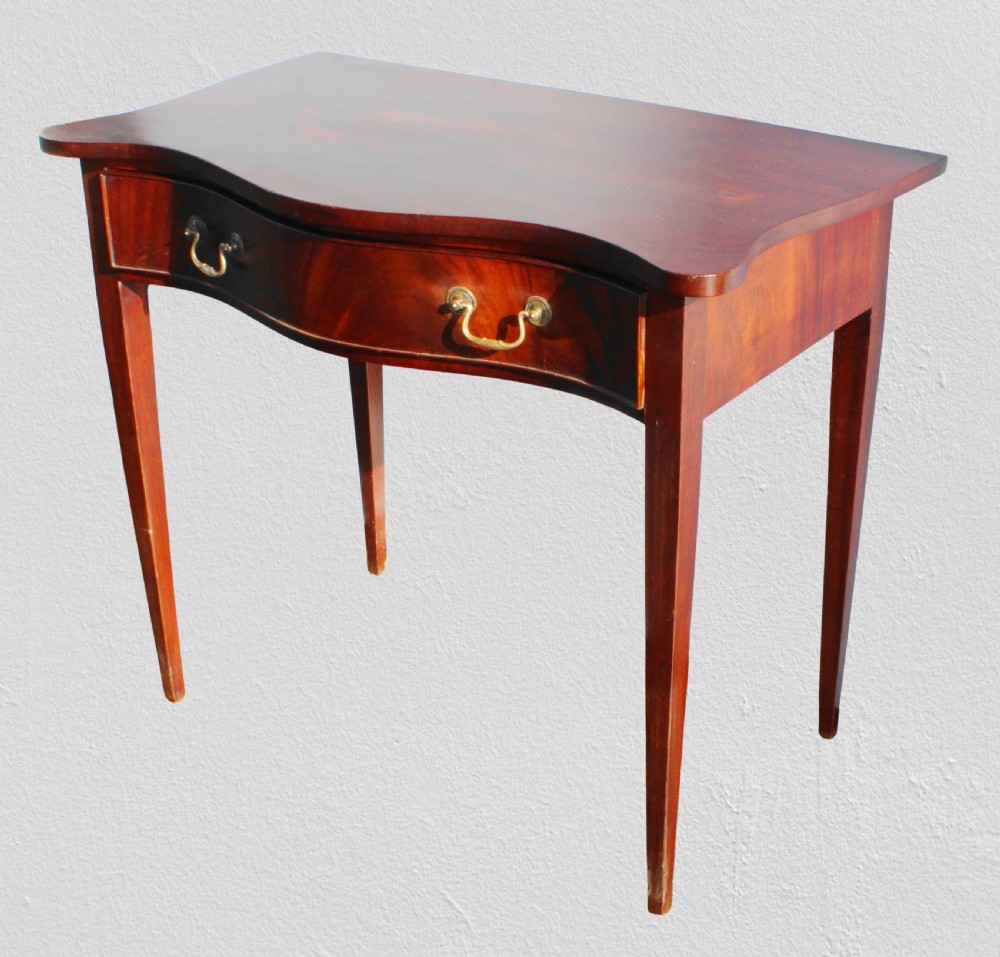 19th century figured mahogany serpentine side table View II