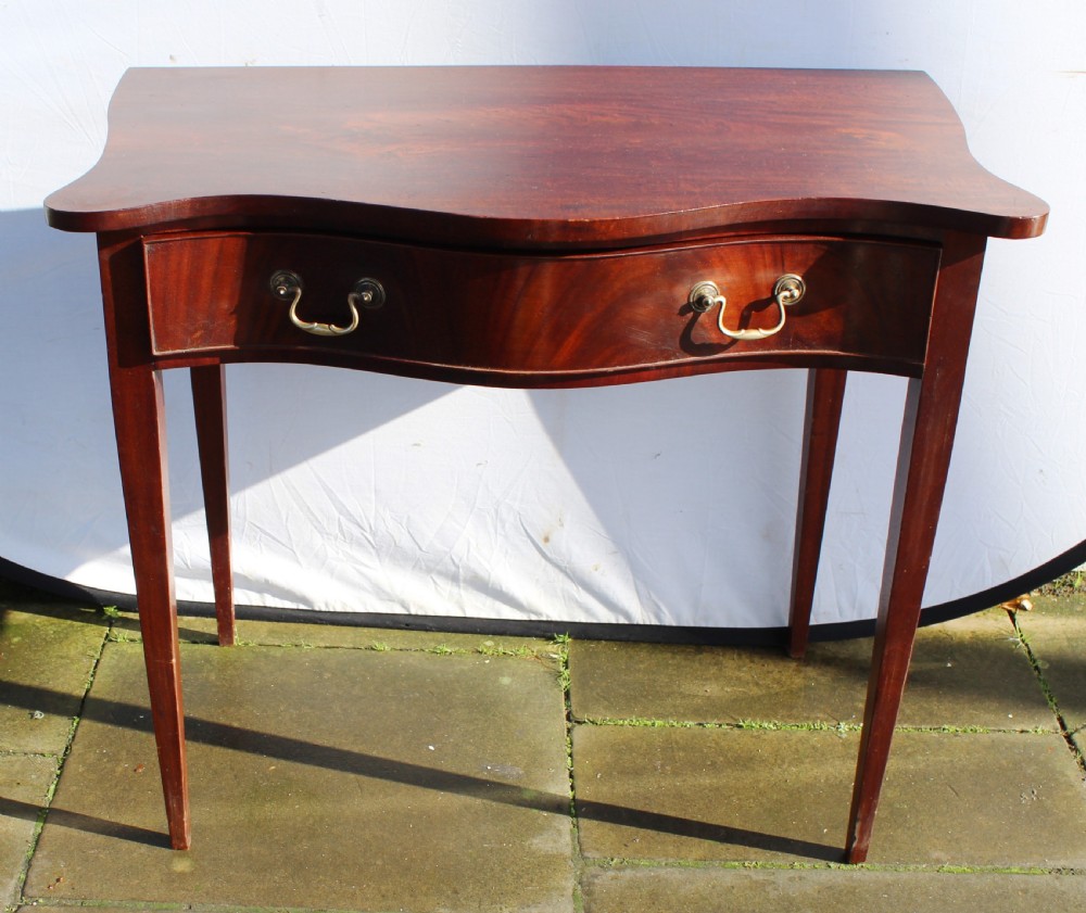 19th century figured mahogany serpentine side table View III