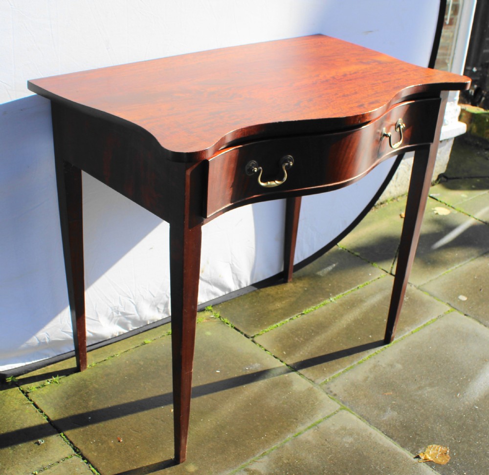 19th century figured mahogany serpentine side table View VI