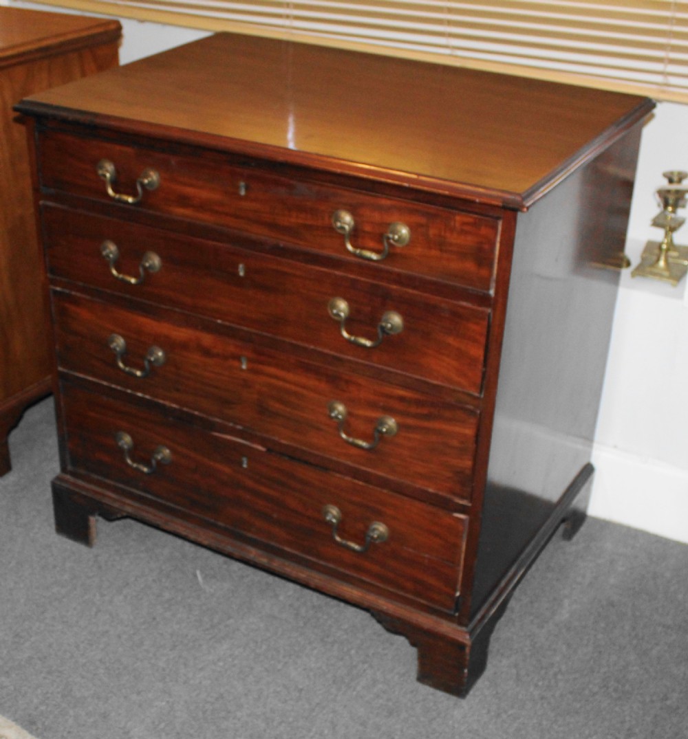 Small George III figured mahogany chest of drawers View II
