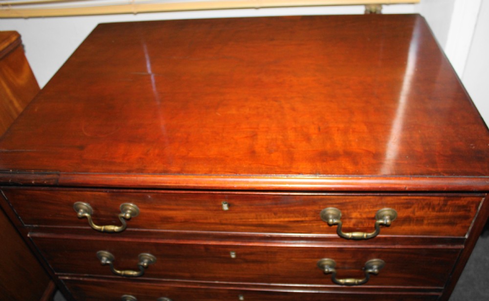 Small George III figured mahogany chest of drawers View VII
