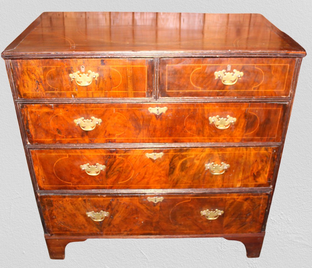 George III Walnut & Elm chest of drawers with oval boxwood line inlay