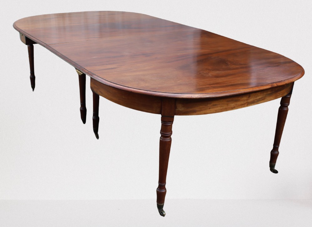 Large early 19th century mahogany dining table