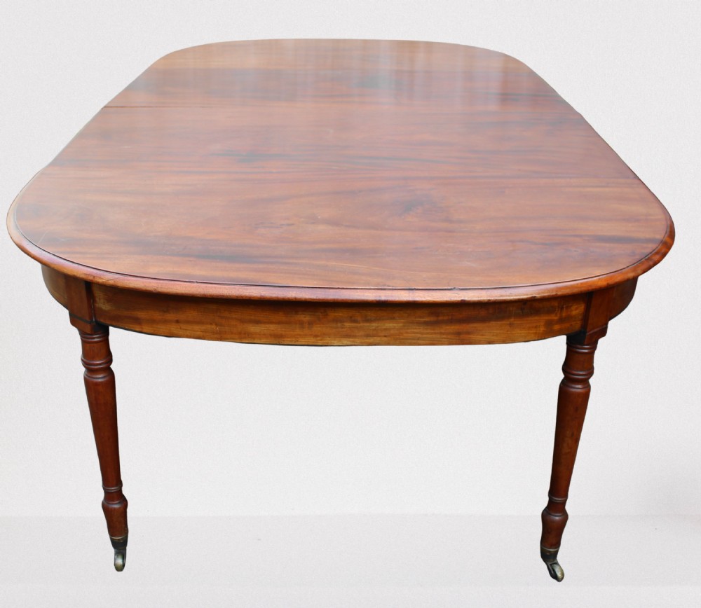 Large early 19th century mahogany dining table View II