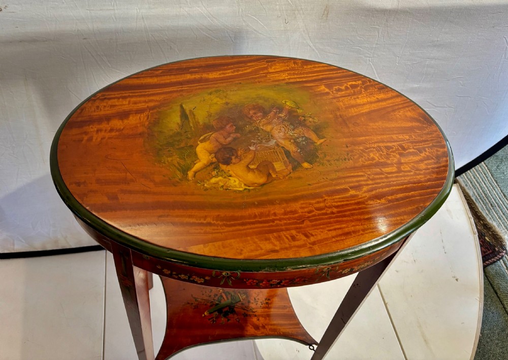 Edwardian satinwood and cherub decorated occasional table  View IV