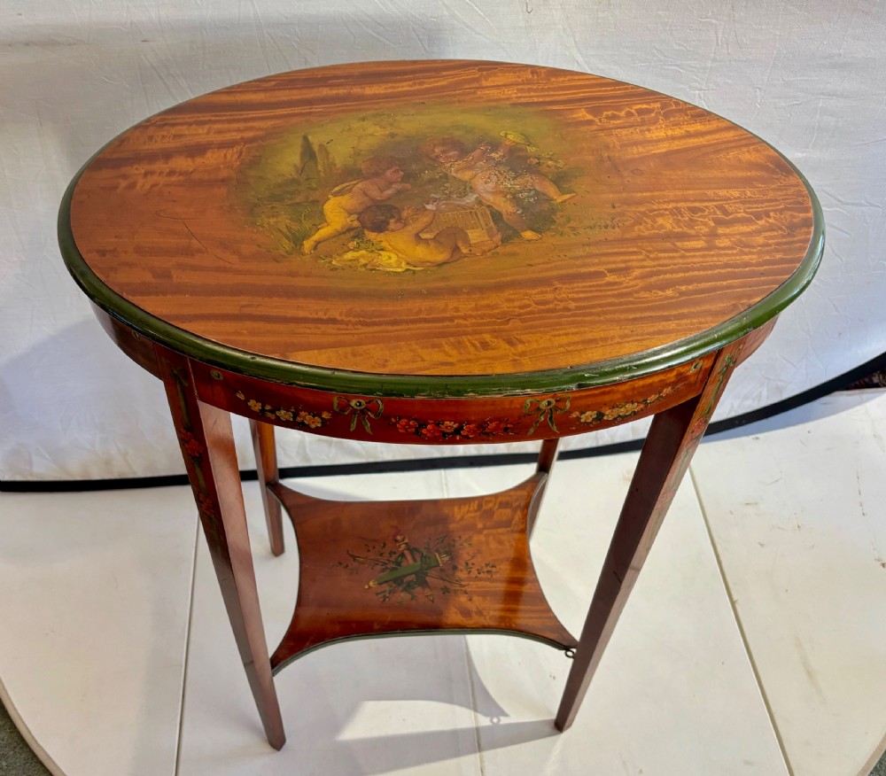 Edwardian satinwood and cherub decorated occasional table  View V