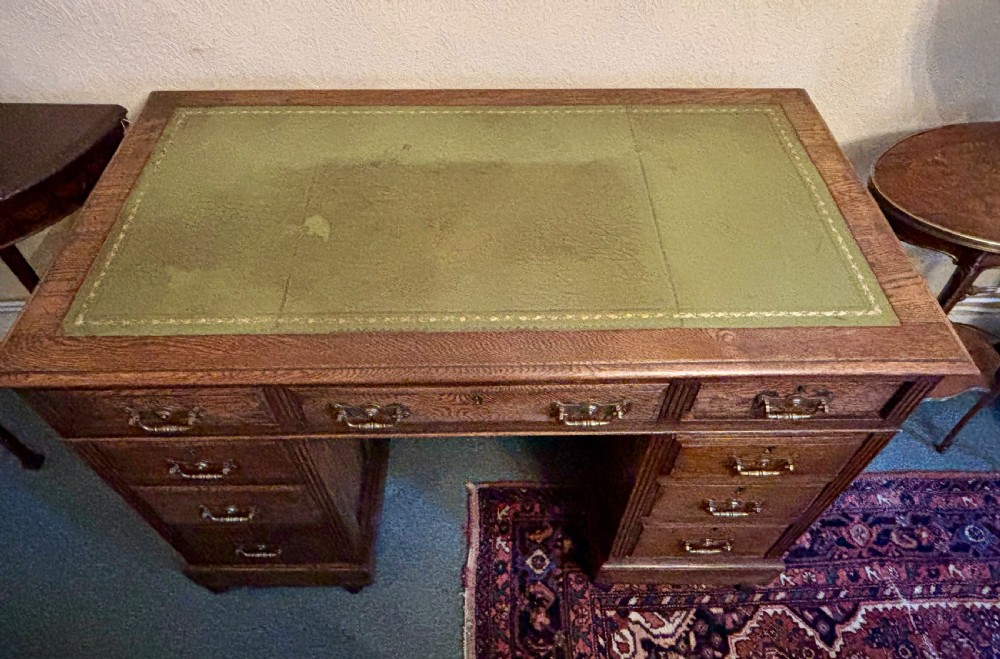 Edwardian oak pedestal desk with gilt tooled leather top View IV