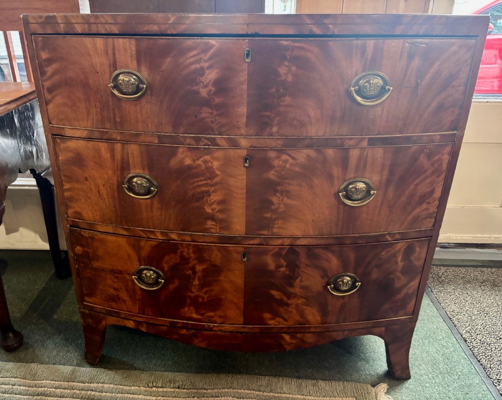 Regency figured mahogany small bow front chest of drawers  View VII