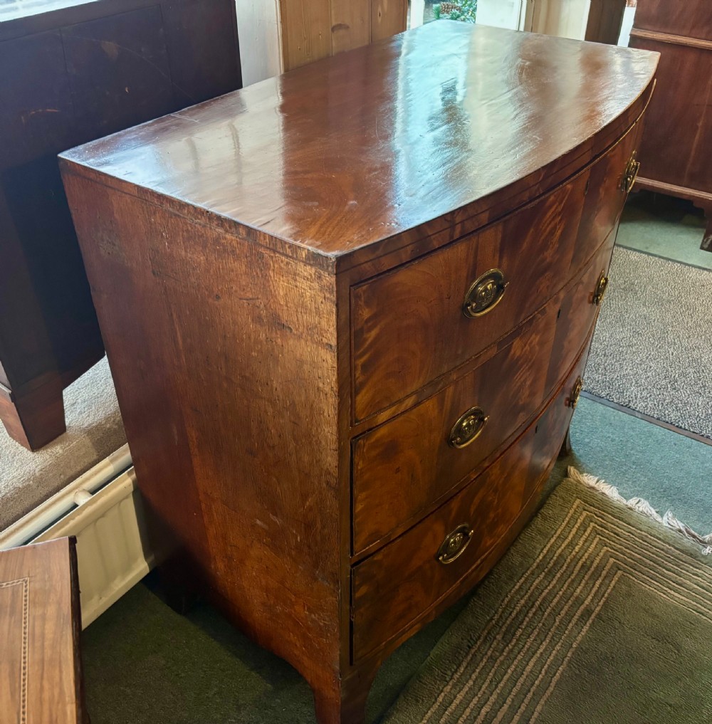 Regency figured mahogany small bow front chest of drawers  View IX