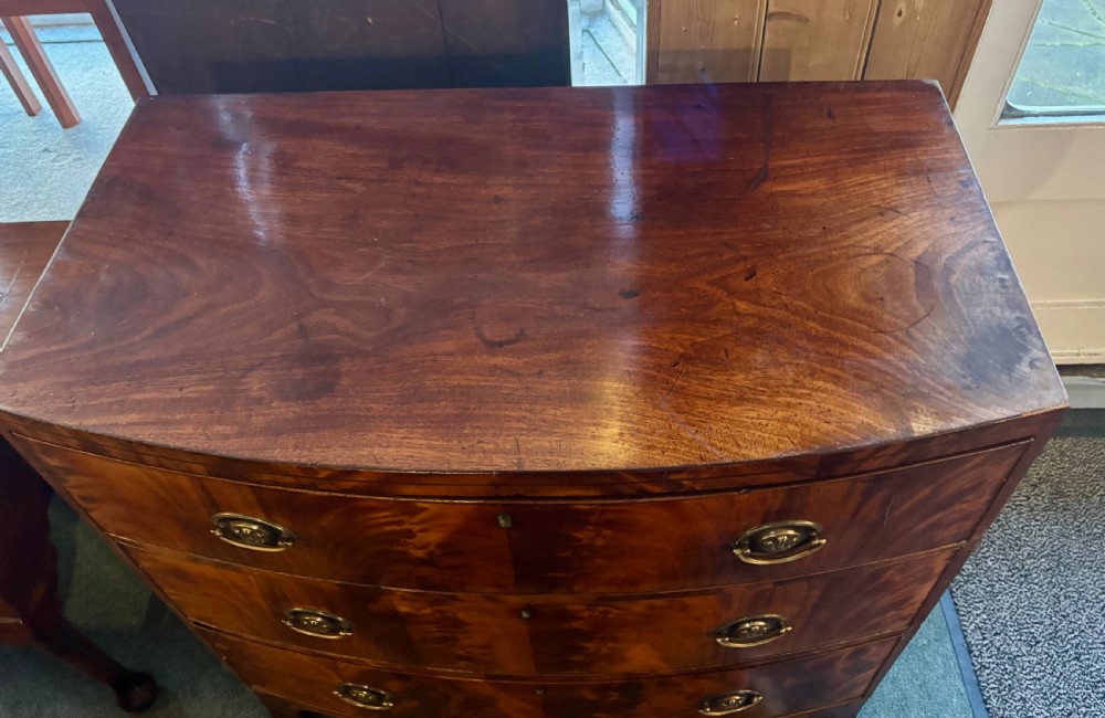 Regency figured mahogany small bow front chest of drawers  View X