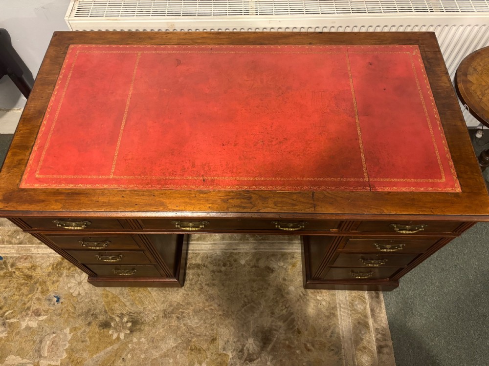 Victorian walnut  pedestal desk with leather top View IX