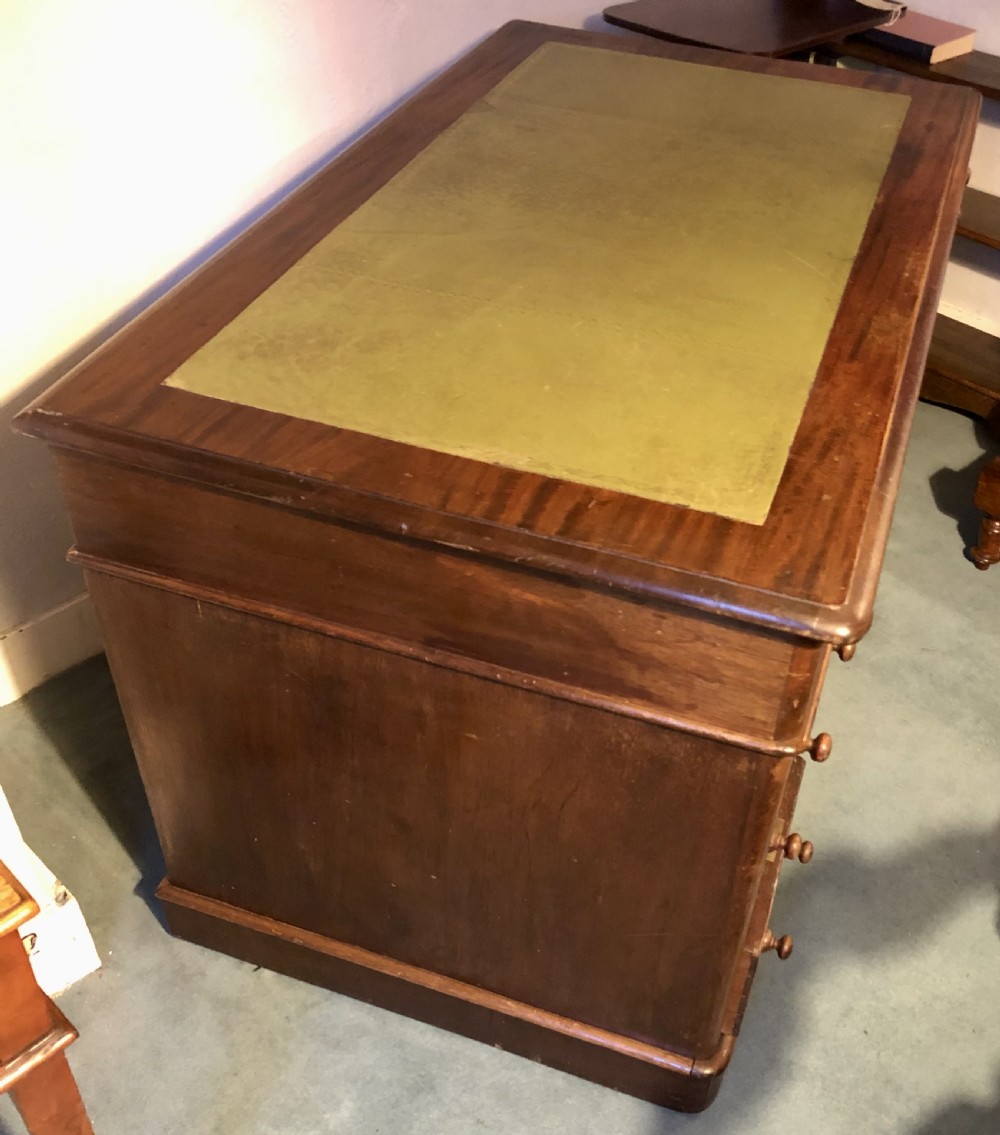 Victorian mahogany pedestal desk with green leather top View VI